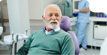 Dentist examining a patients mouth